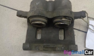 Суппорт передний правый от Kia Sorento 2002-2009