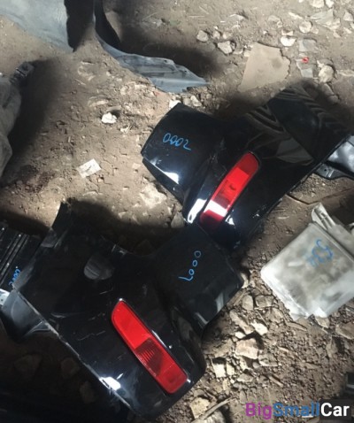 Клык Бампера аутлендер хл 2008 - купить Белой Глине