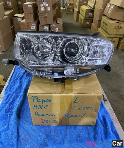 Фара левая Митсубиси Паджеро Спорт Mitsubishi Paje